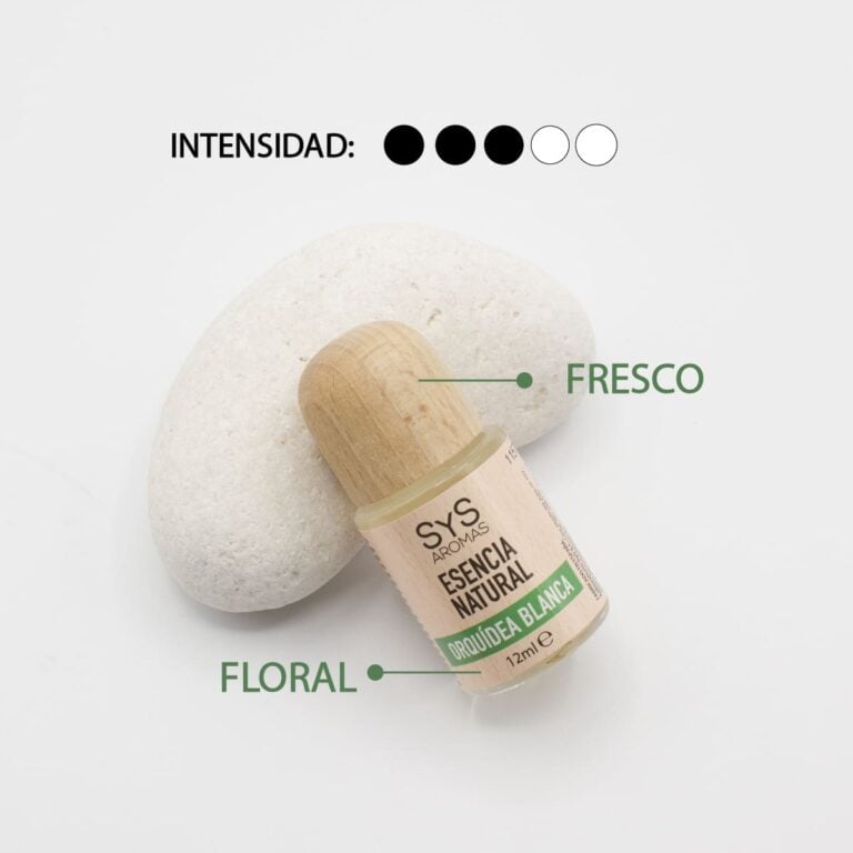 Esencia Orquídea Blanca 12ml SYS Aromas junto a una piedra blanca con perfil fresco y floral e intensidad tres de cinco