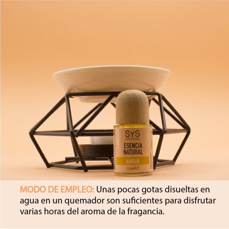 Esencia Ámbar 12ml SYS Aromas junto a un quemador de esencias con instrucciones de uso