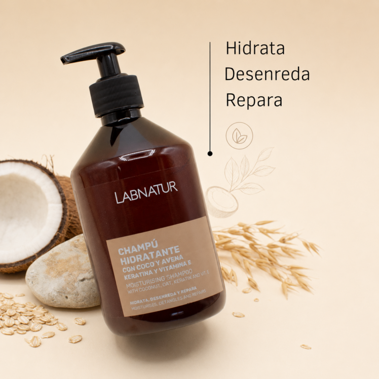 Champú Hidratante Coco y Avena con Keratina 500ml Labnatur inclinado junto a coco, avena y una piedra clara