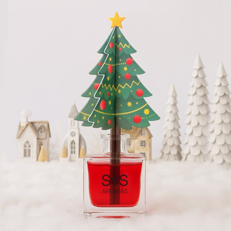 Ambientador Difusor Árbol de Navidad Frutos Rojos 90ml SYS Aromas ante un pueblo navideño nevado